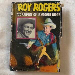 Vintage Roy Roger's and the Raiders of Sawtooth Ridge with paper cover 1946